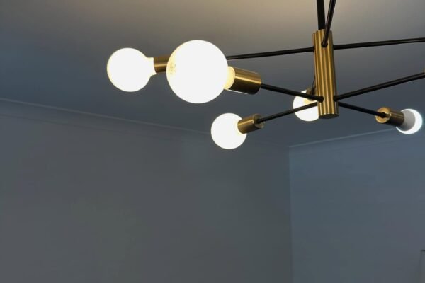 Modern multi-arm pendant light fitting on a bedroom ceiling – Marmont Electrical