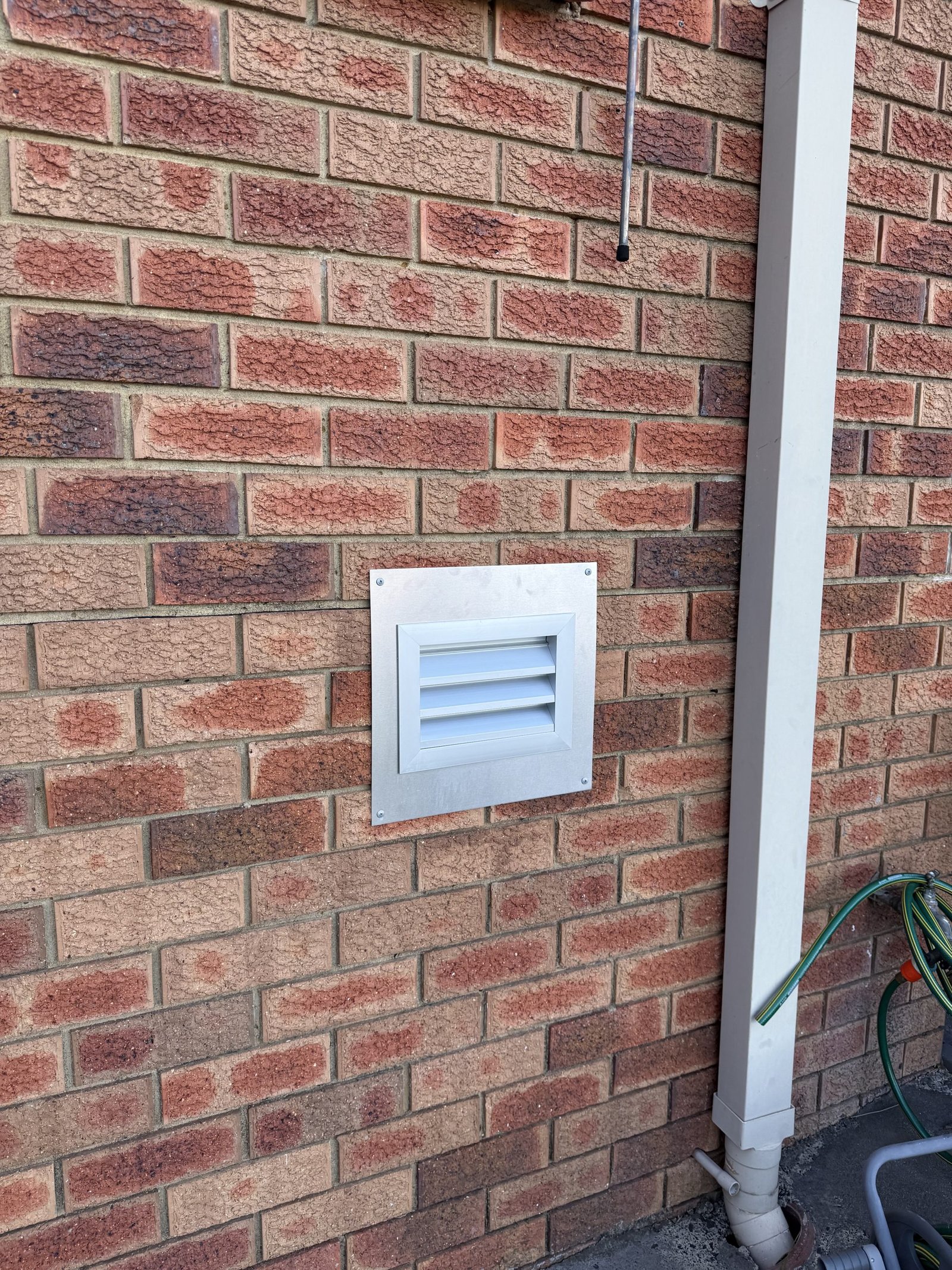 Weatherproof external ventilation grille installed on a Frenchs Forest home